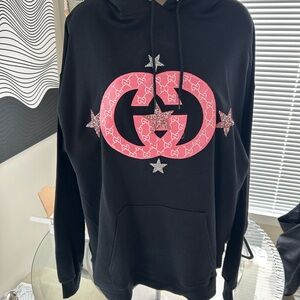 Women's Black Pullover Hoodie with Pink Logo and Star Accents